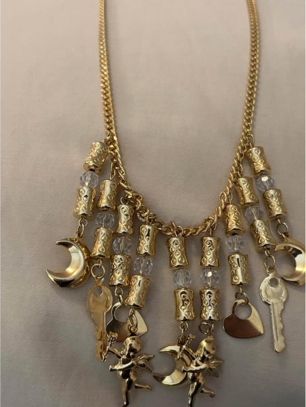 Gold Charm Necklace with Moons Cherubs and Keys